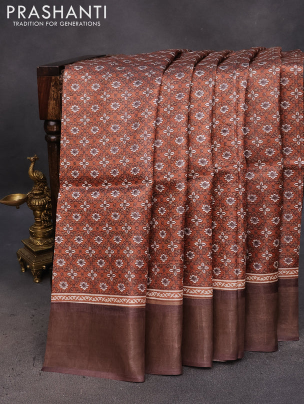 Pure tussar silk saree rust shade and brown with allover prints and zari woven border