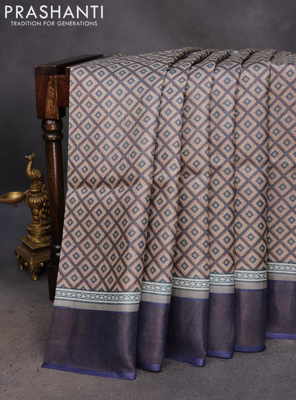 Pure tussar silk saree black and blue with allover prints and zari woven border