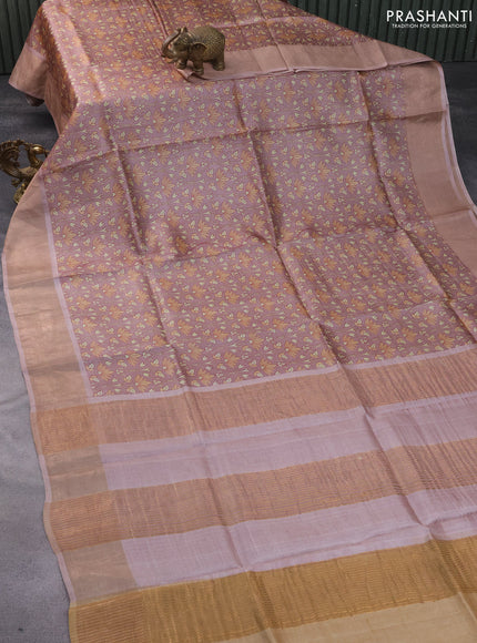 Pure tussar silk saree pastel brown with allover floral prints and zari woven border