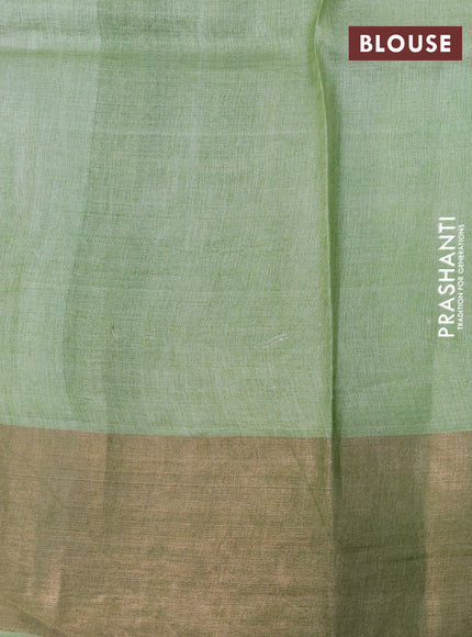 Pure tussar silk saree green shade and pista green with allover floral prints and zari woven border