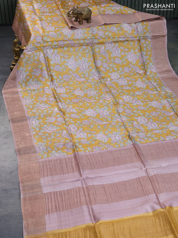 Pure tussar silk saree mustard yellow and pastel pink with allover floral prints and zari woven border