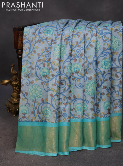 Pure tussar silk saree grey shade and teal blue with allover kalamkari prints and zari woven border