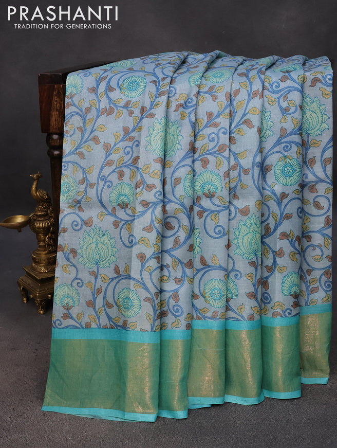 Pure tussar silk saree grey shade and teal blue with allover kalamkari prints and zari woven border