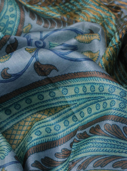 Pure tussar silk saree grey shade and teal blue with allover kalamkari prints and zari woven border