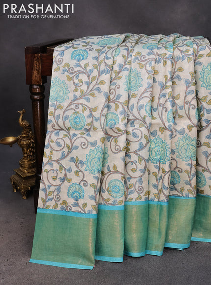 Pure tussar silk saree off white and light blue with allover kalamkari prints and zari woven border