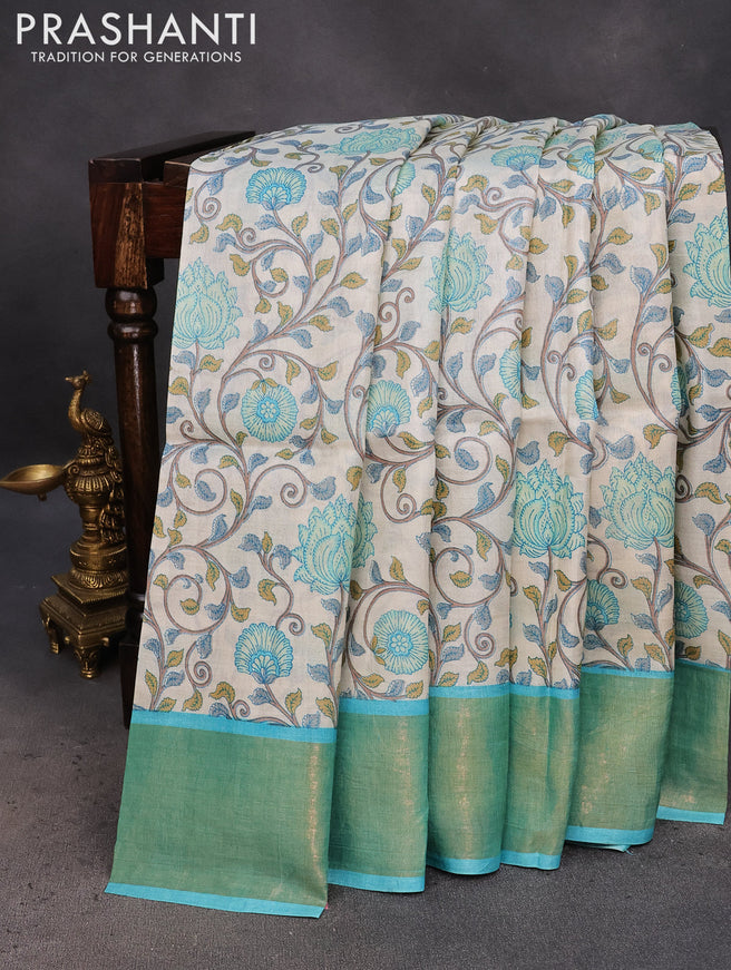 Pure tussar silk saree off white and light blue with allover kalamkari prints and zari woven border