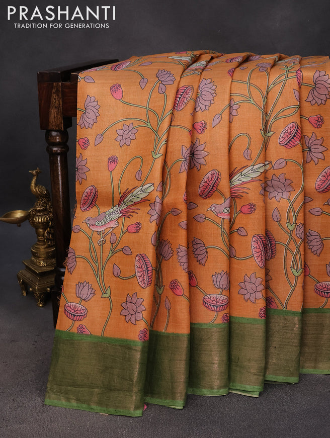 Pure tussar silk saree orange and green with allover kalamkari prints and zari woven border