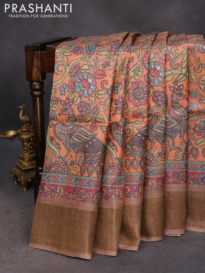 Pure tussar silk saree orange and brown with allover kalamkari prints and zari woven border