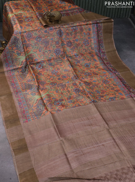 Pure tussar silk saree orange and brown with allover kalamkari prints and zari woven border