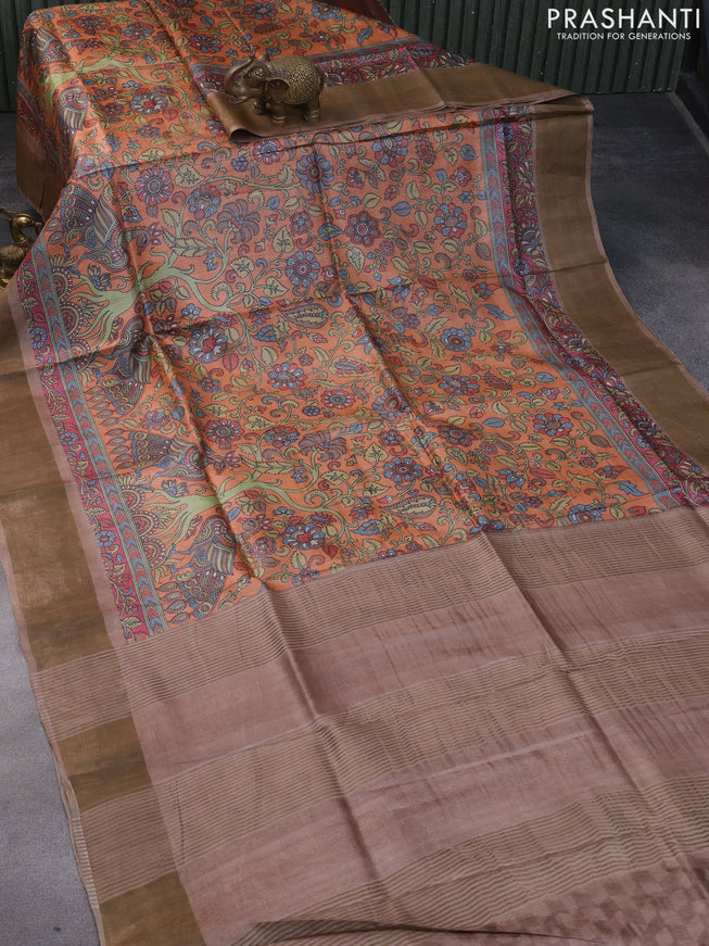 Pure tussar silk saree orange and brown with allover kalamkari prints and zari woven border