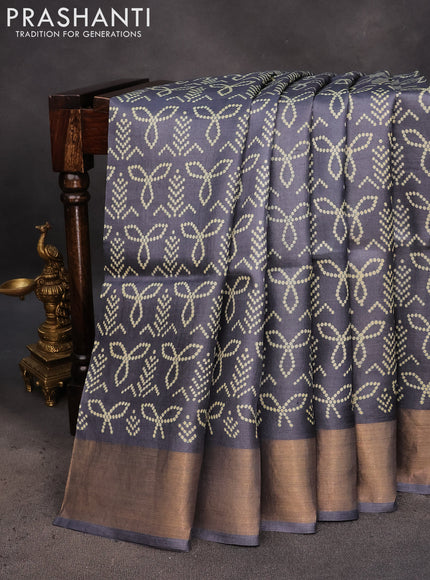 Pure tussar silk saree elephant grey with allover bandhani prints and zari woven border