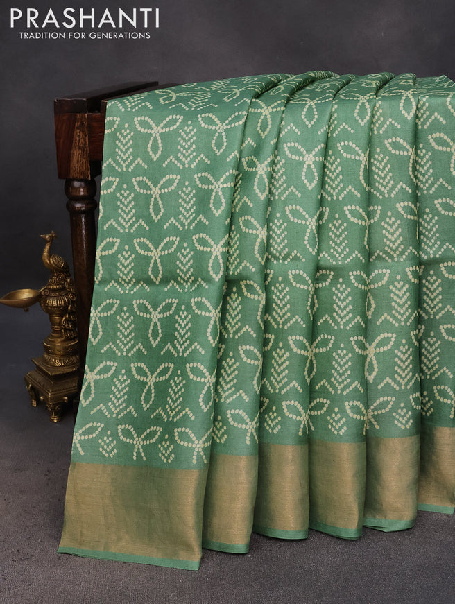 Pure tussar silk saree green with allover bandhani prints and zari woven border