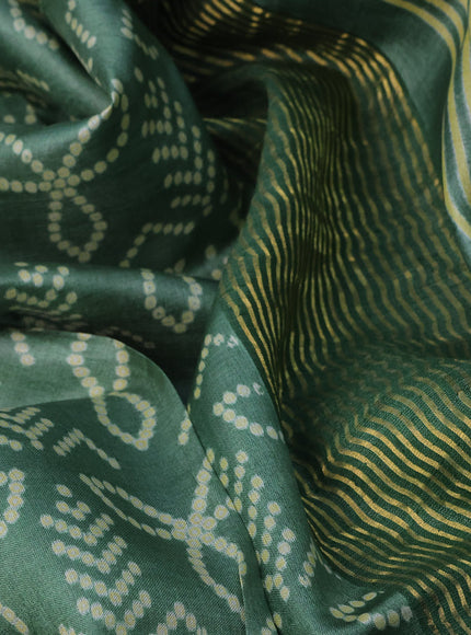 Pure tussar silk saree green with allover bandhani prints and zari woven border