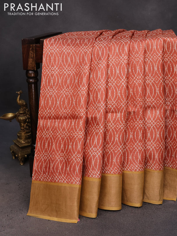 Pure tussar silk saree orange and mustard yellow with allover prints and zari woven border