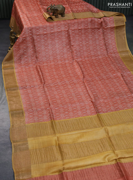 Pure tussar silk saree orange and mustard yellow with allover prints and zari woven border