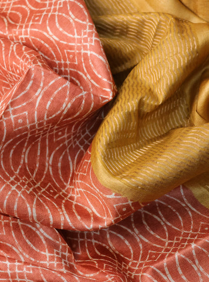 Pure tussar silk saree orange and mustard yellow with allover prints and zari woven border