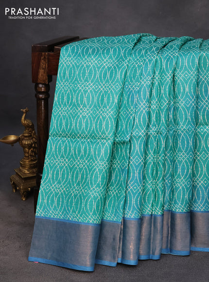 Pure tussar silk saree teal green and blue with allover prints and zari woven border