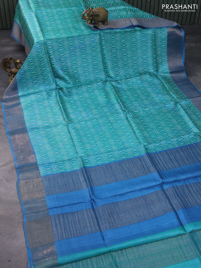 Pure tussar silk saree teal green and blue with allover prints and zari woven border