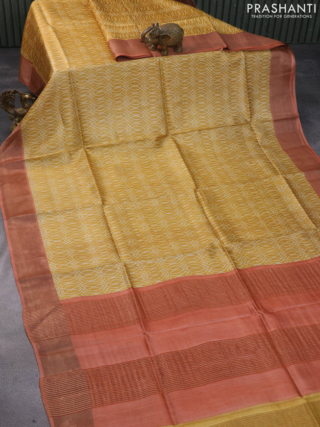 Pure tussar silk saree mustard yellow and peach orange with allover prints and zari woven border