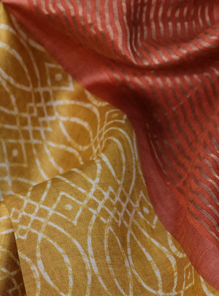 Pure tussar silk saree mustard yellow and peach orange with allover prints and zari woven border