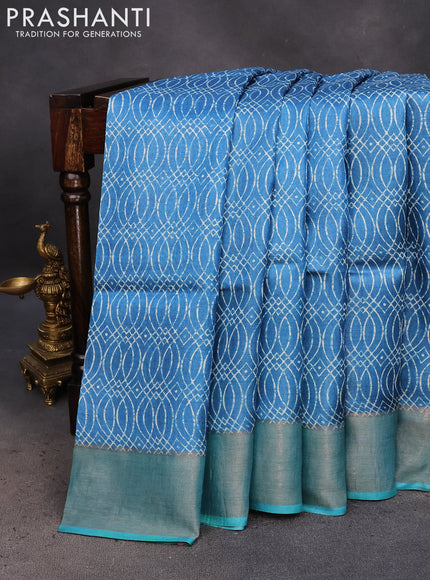 Pure tussar silk saree cs blue and teal blue with allover prints and zari woven border