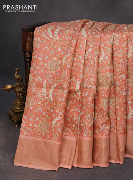 Pure tussar silk saree peach orange with allover kalamkari prints and zari woven border