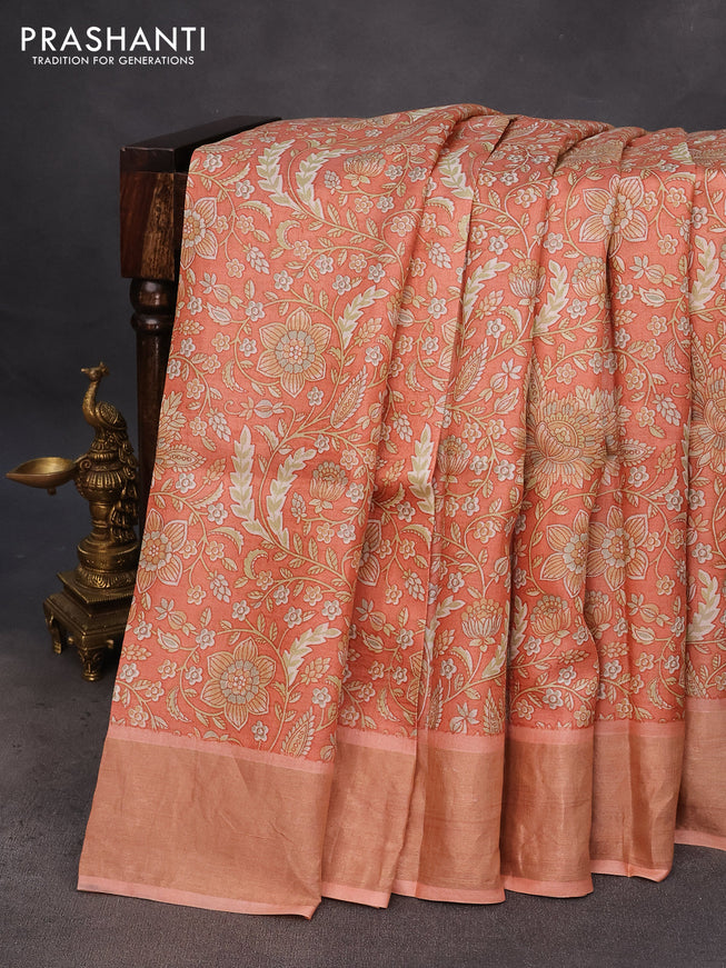 Pure tussar silk saree peach orange with allover kalamkari prints and zari woven border