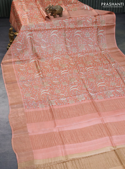 Pure tussar silk saree peach orange with allover kalamkari prints and zari woven border