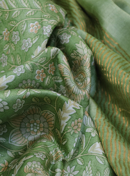 Pure tussar silk saree green shade with allover kalamkari prints and zari woven border