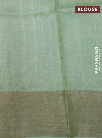 Pure tussar silk saree green shade with allover kalamkari prints and zari woven border