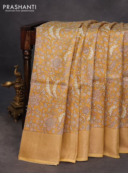 Pure tussar silk saree mustard yellow with allover kalamkari prints and zari woven border