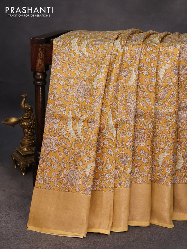 Pure tussar silk saree mustard yellow with allover kalamkari prints and zari woven border