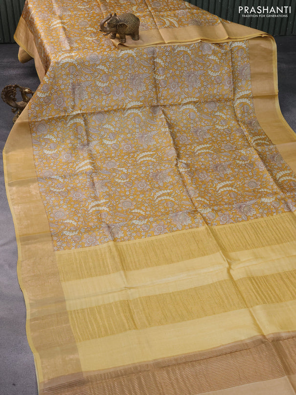 Pure tussar silk saree mustard yellow with allover kalamkari prints and zari woven border