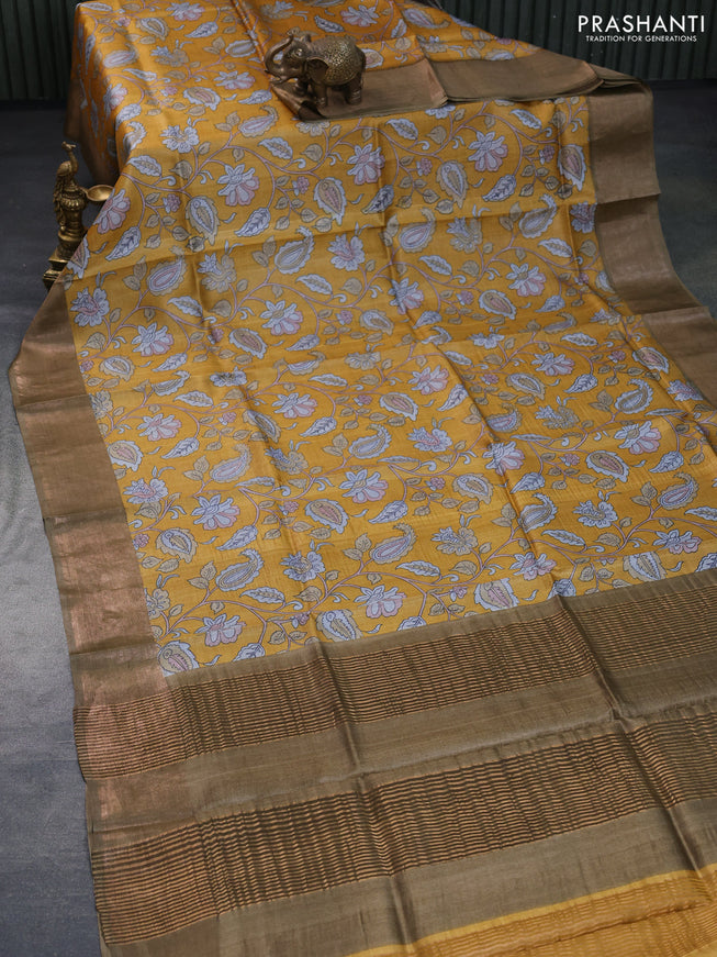 Pure tussar silk saree brown and orange with allover kalamkari prints and zari woven border