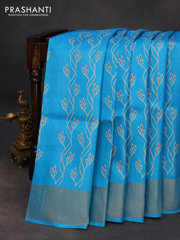 Pure tussar silk saree light blue with allover prints and zari woven border