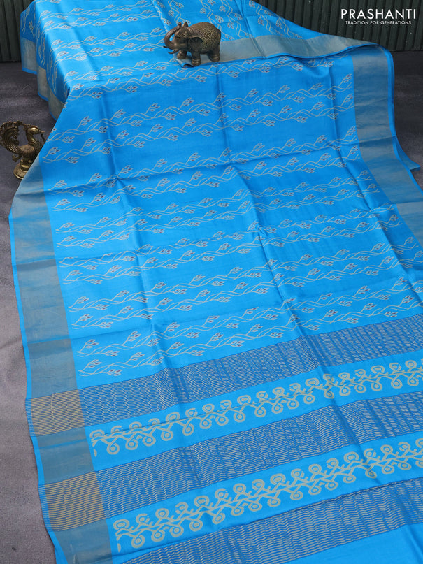 Pure tussar silk saree light blue with allover prints and zari woven border