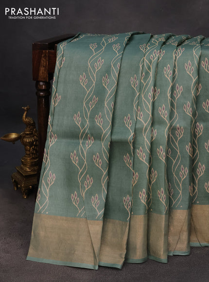 Pure tussar silk saree pastel green with allover prints and zari woven border