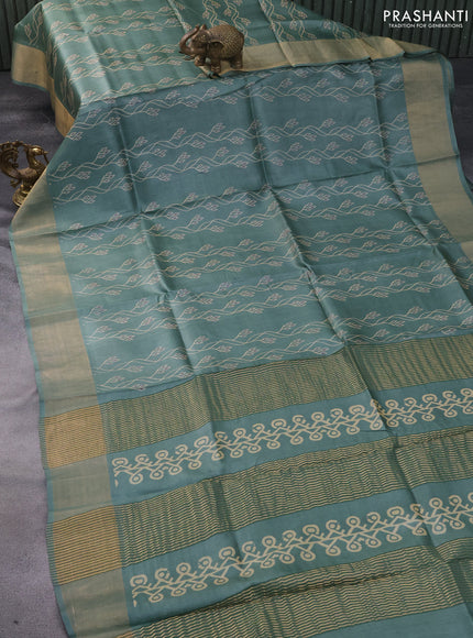 Pure tussar silk saree pastel green with allover prints and zari woven border