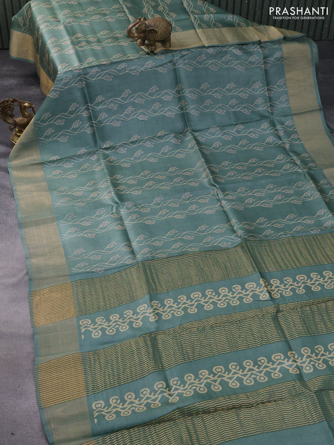 Pure tussar silk saree pastel green with allover prints and zari woven border