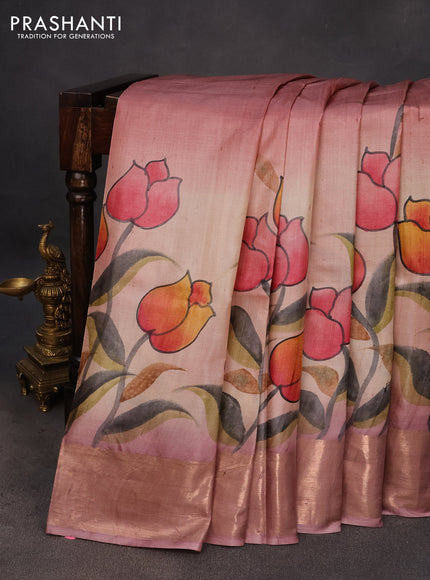 Pure tussar silk saree pastel peach shade and mauve pink with hand painted floral prints and zari woven border