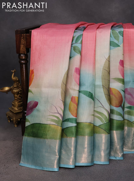 Pure tussar silk saree pastel blue with hand painted floral prints and zari woven border