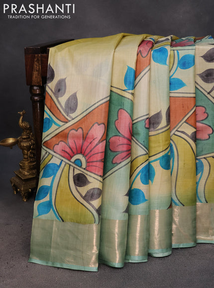 Pure tussar silk saree cream and pastel blue with allover hand painted prints and zari woven border