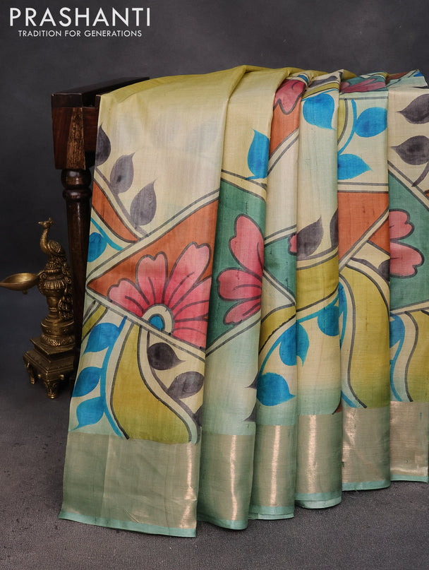 Pure tussar silk saree cream and pastel blue with allover hand painted prints and zari woven border