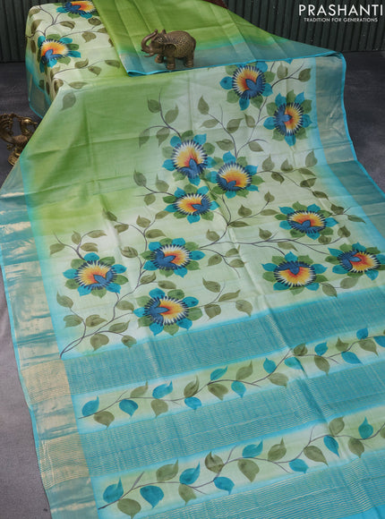 Pure tussar silk saree pastel green and teal blue with hand painted floral prints and zari woven border