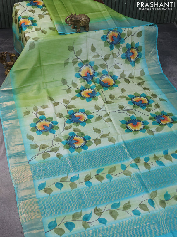 Pure tussar silk saree pastel green and teal blue with hand painted floral prints and zari woven border