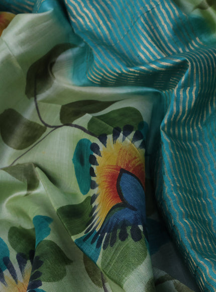 Pure tussar silk saree pastel green and teal blue with hand painted floral prints and zari woven border