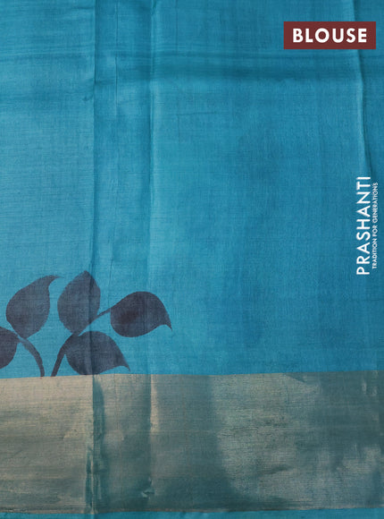 Pure tussar silk saree pastel green and teal blue with hand painted floral prints and zari woven border