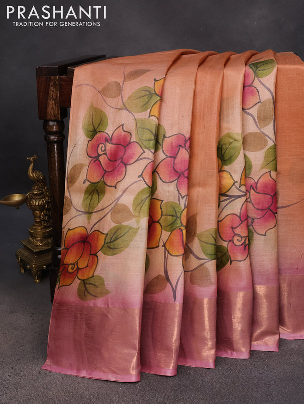 Pure tussar silk saree peach orange and pink shade with hand painted floral prints and zari woven border