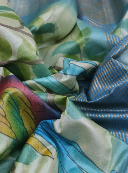 Pure tussar silk saree pastel green and blue with hand painted prints and zari woven border