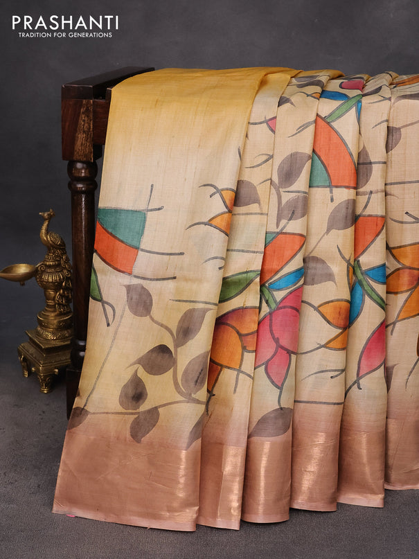 Pure tussar silk saree sandal and pastel brown with hand painted floral prints and zari woven border